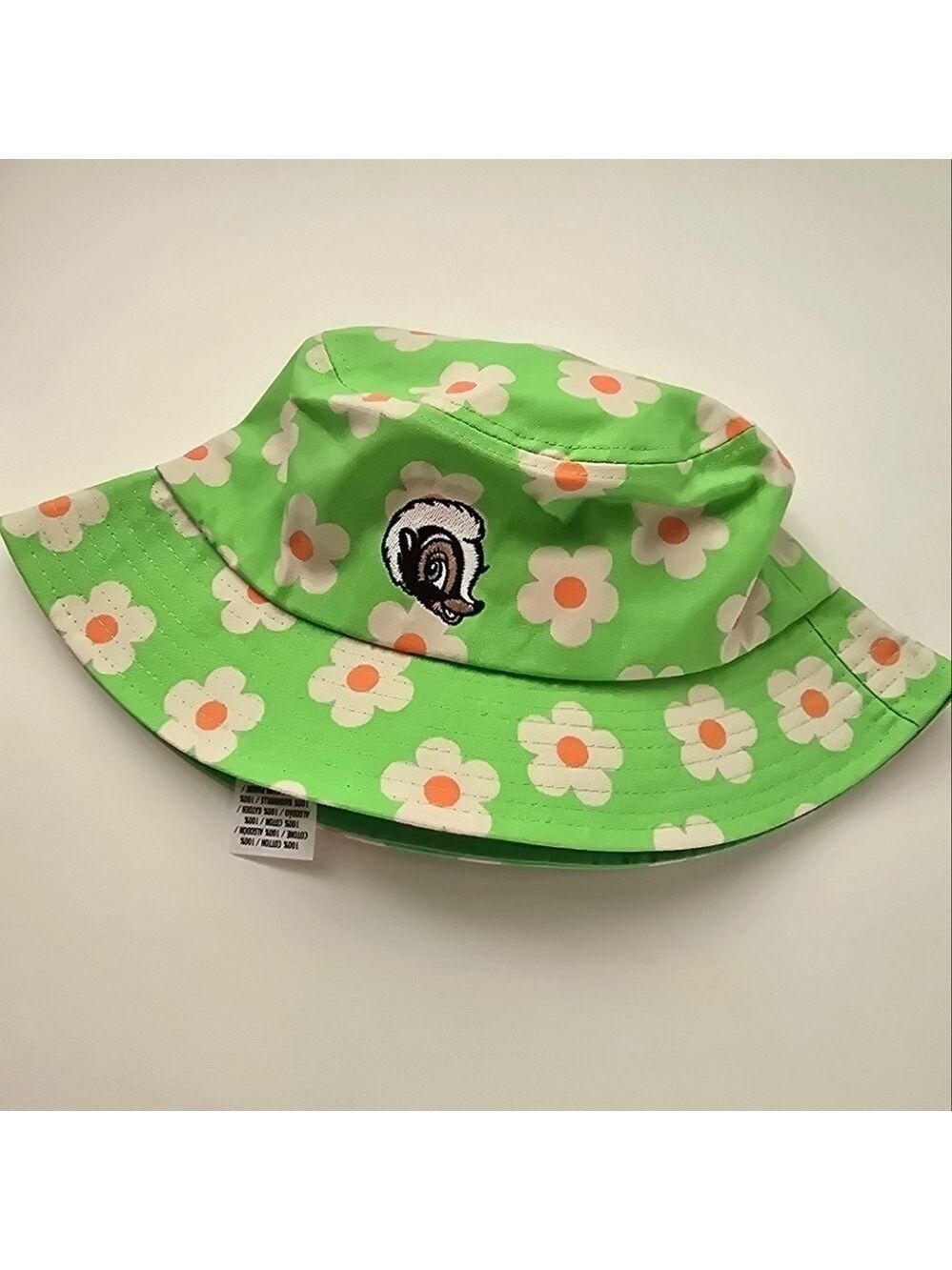 NWT Disney Parks Bambi Skunk Flower Green White Daisy Adult Bucket Hat